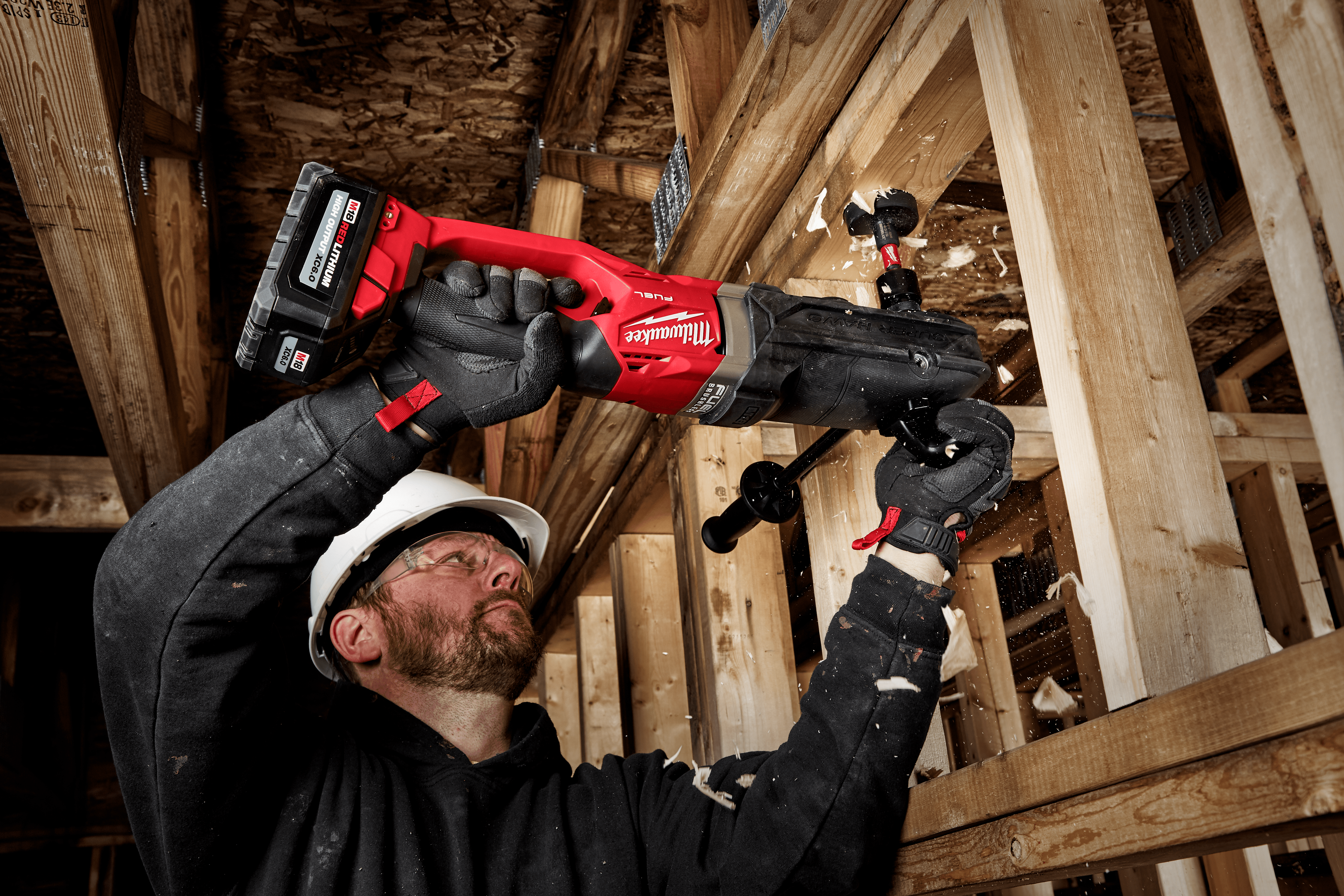 Plumber using Milwaukee Tool