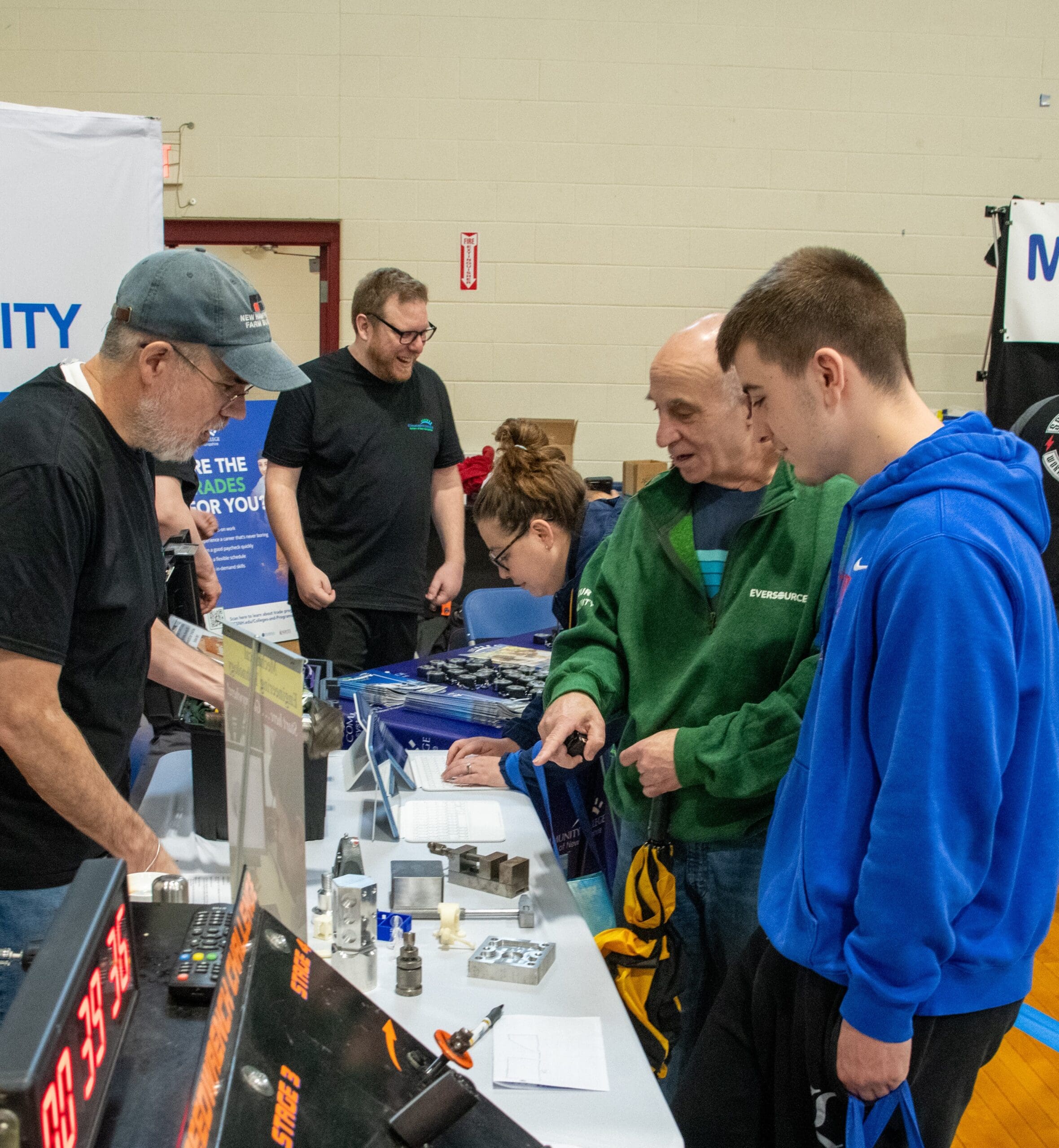 Londonderry NH Skills Expo Image of People at Table at Londonderry High School